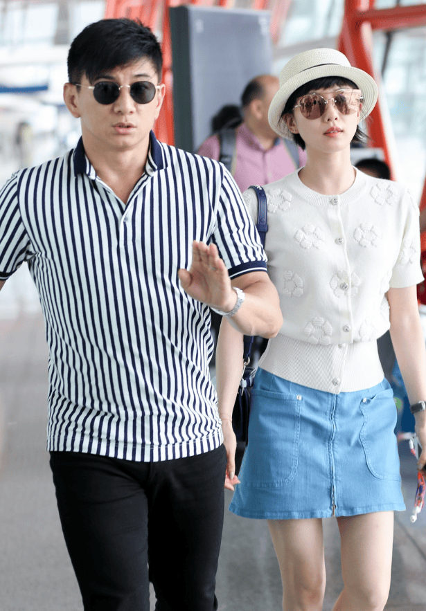 刘诗诗与大17岁的吴奇隆走机场,穿衣打扮洋气,反衬男方略显微胖